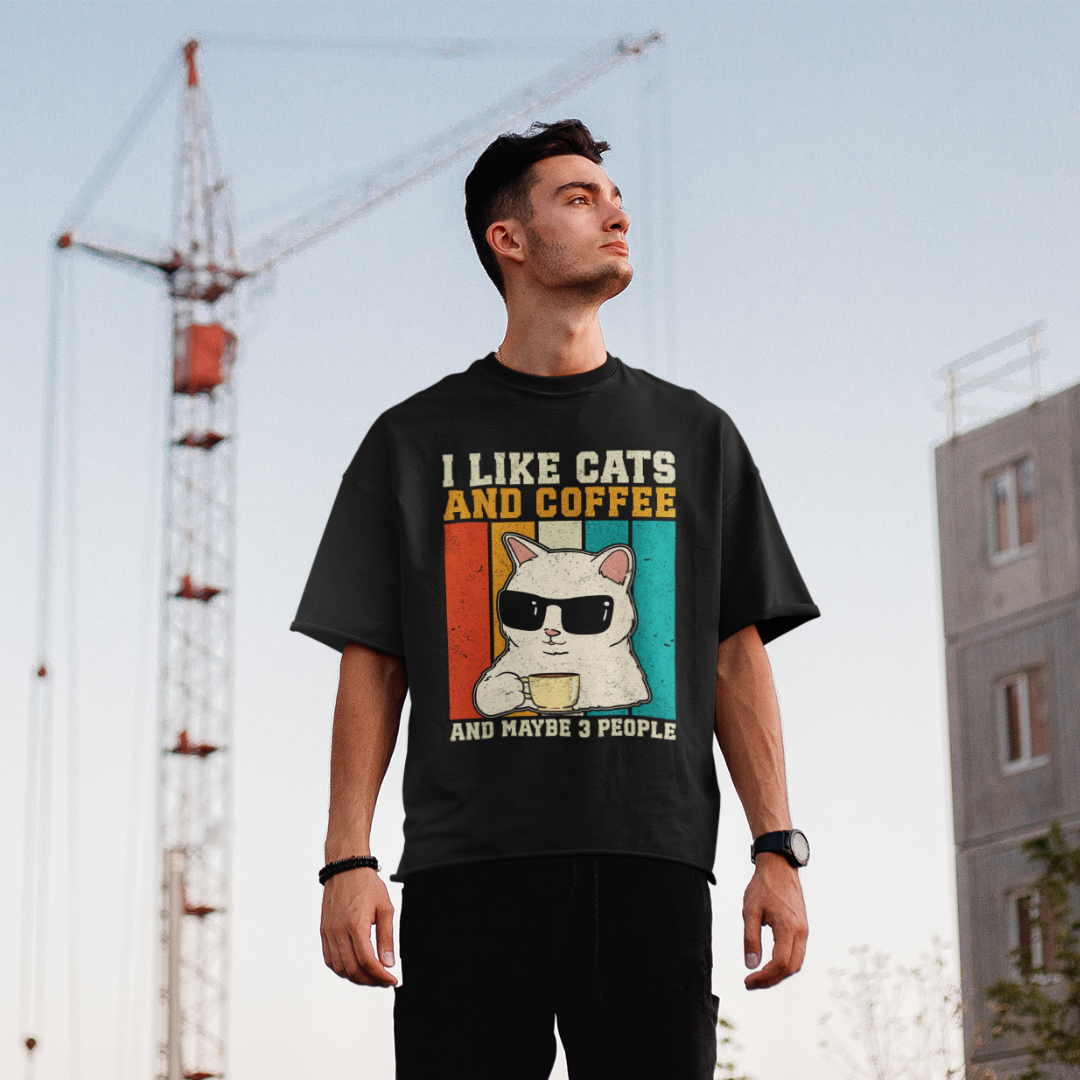 Coffee First, Cats Always – The Ultimate Unisex Oversized Tee for Effortless Cool!